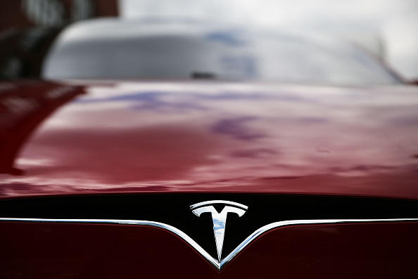 Last Year, An Apple Engineer Died While Driving His Tesla. Now, His Family Is Suing The Company