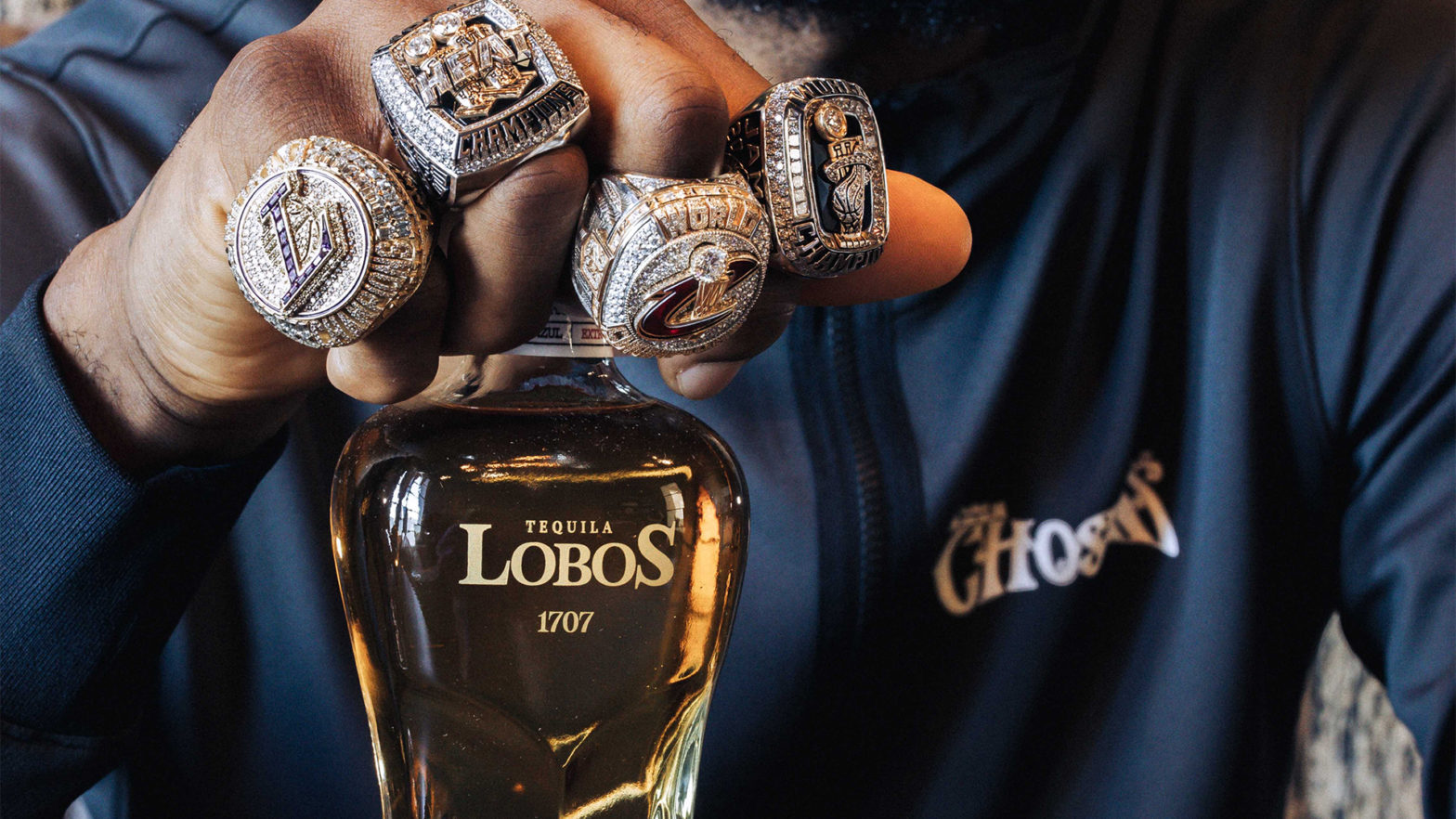 LeBron James Dons All His Championship Rings To Promote New Lobos 1707 Extra Anejo Tequila Bottle