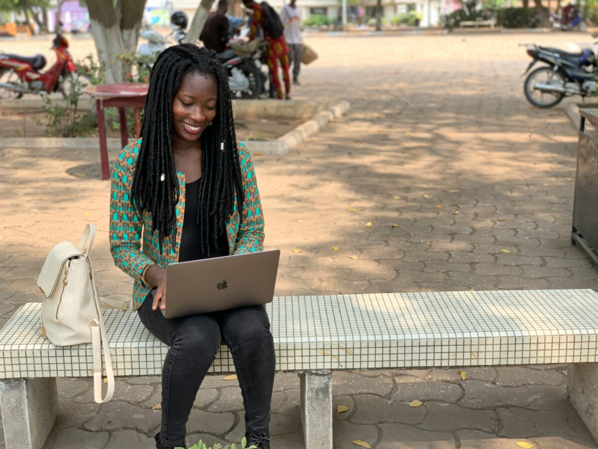 Deferred Resignation Fork in the Road email pictured: woman using laptop